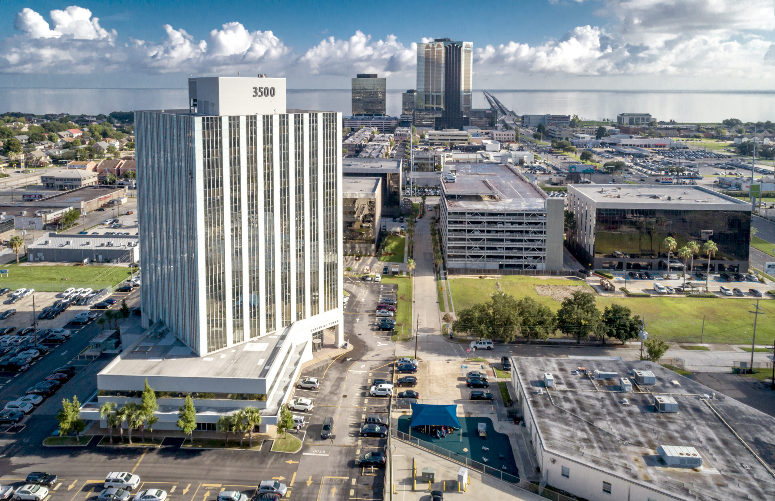 An aerial view of Executive Tower at 3500 N Causeway Blvd in Metairie, LA on a sunny day.